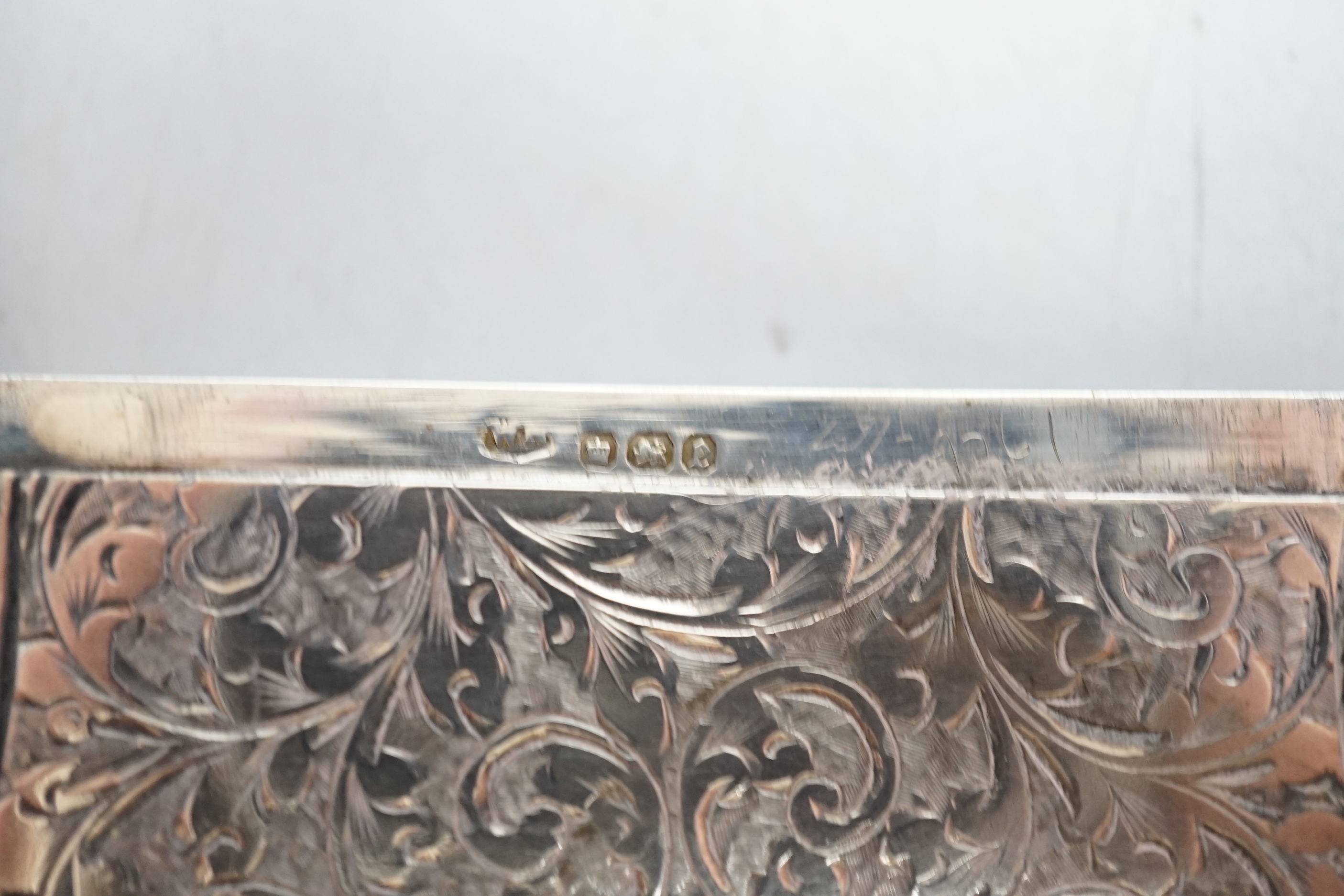 Two Victorian engraved silver card cases, largest by Hilliard & Thomasson, Birmingham, 1850, 10.1cm.